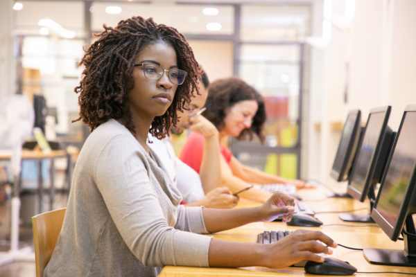 woman looking at computer